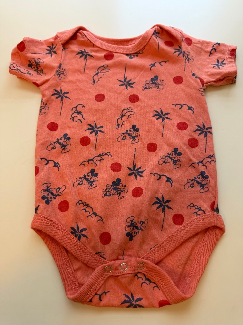 Junk Food Clothing Coral Pink Bodysuit with Navy Character Print
